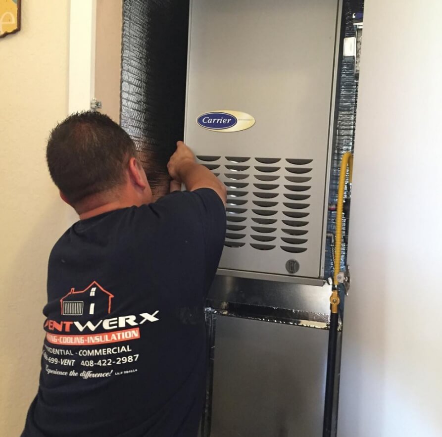 HVAC technician fixing home furnace in San Jose